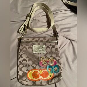 Coach cross body like new gold multi color 9x7